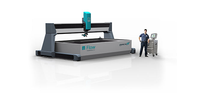 A Flow Waterjet Technician next to a Mach 4 